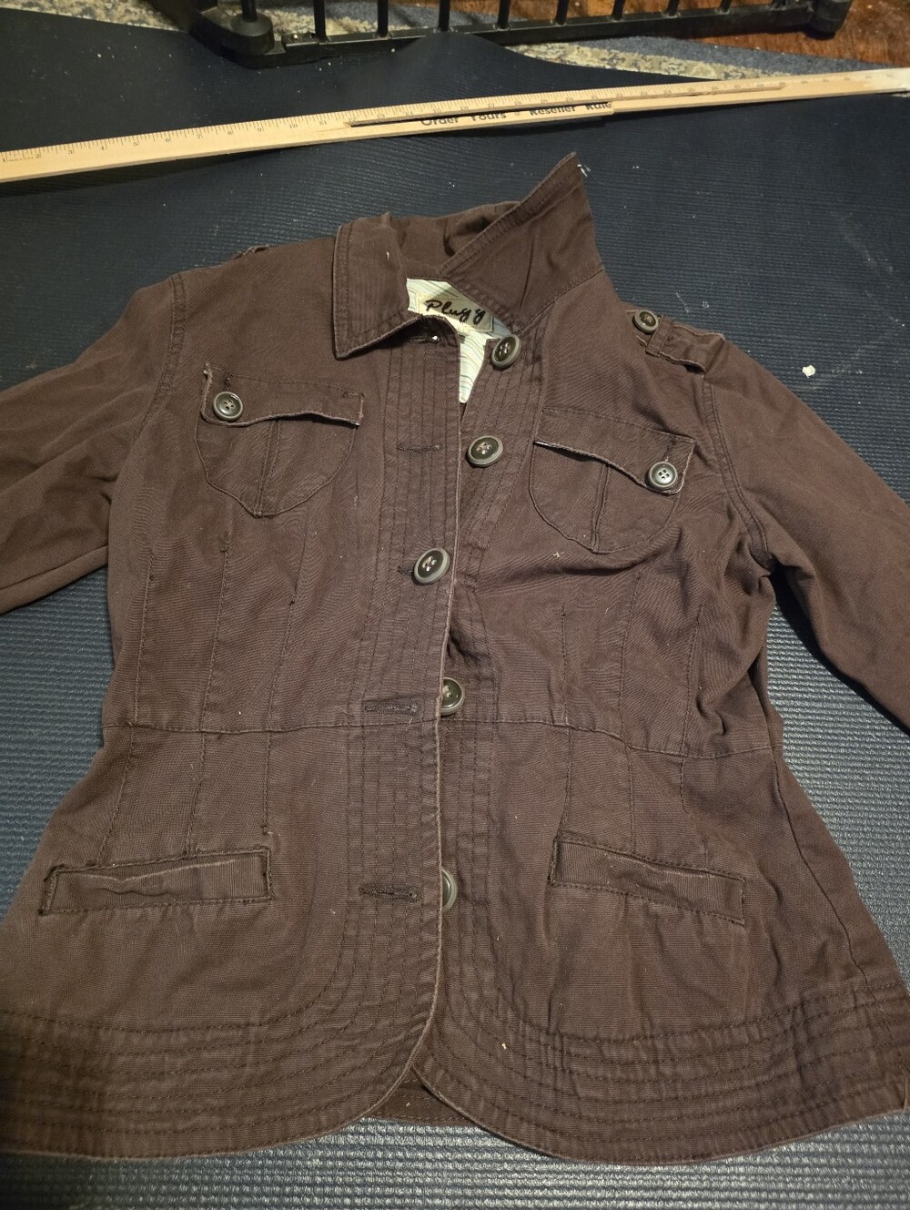 Brown Plugg jacket with button-up front and pockets, size L